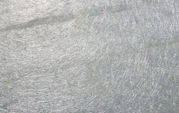 Knock laminate fibreglass or shingles?