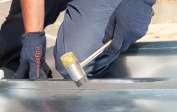 Knock metal flat roofing repairs